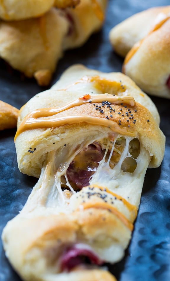 Reuben Crescent Rolls- crescent rolls stuffed with corned beef, swiis cheese, kraut, and thousand island dressing.