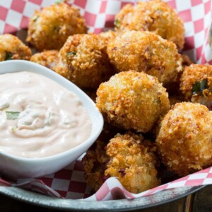 Reuben Fritters with a mashed potato base and chopped corned beef, swiss cheese, and sauerkraut.