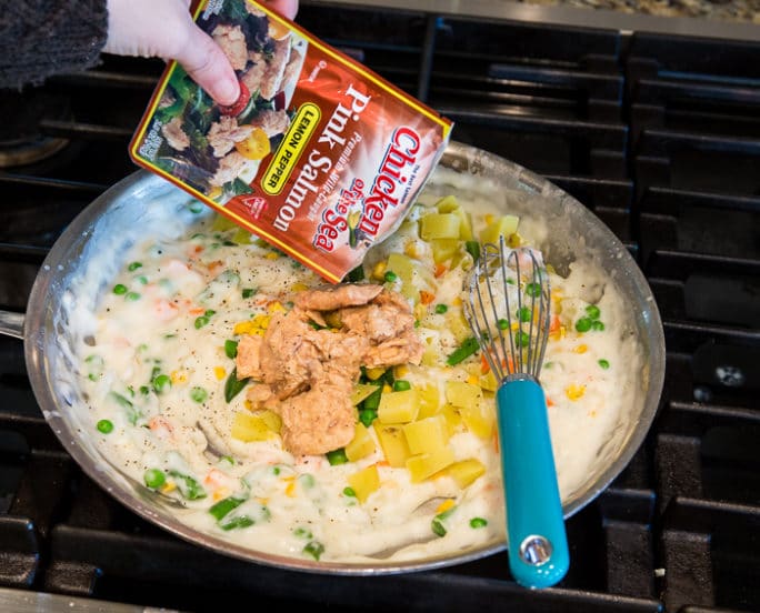 Salmon Pot Pie with a thick and creamy filling. Super easy to make with a refrigerated pie crust and Chicken of the Sea Salmon.