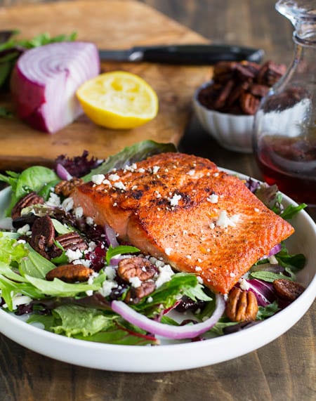 Seared Salmon over Mixed Greens with Dried Cranberries, Feta, and Candied Pecans