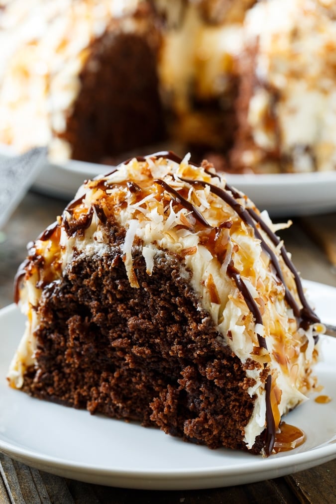 Samoa Bundt Cake- moist chocolate cake covered in caramel frosting and toasted coconut