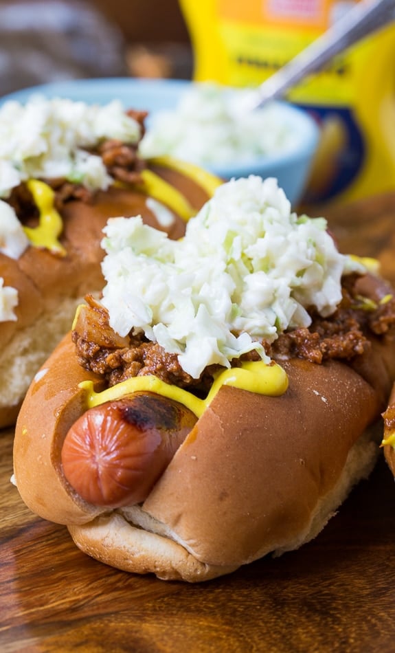 Carolina-Style Slaw Dogs with mustard and homemade chili.