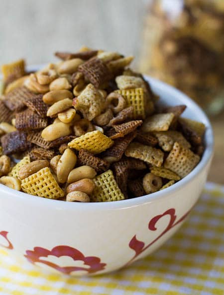 Snack Mix in a red and white bowl.