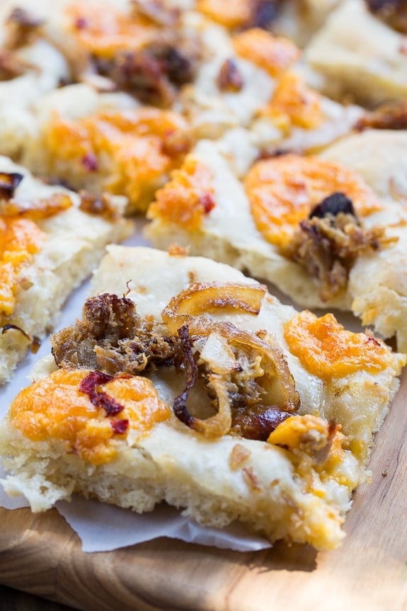 Southern-Style Focaccia with pulled pork, pimento cheese, and vidalia onion.