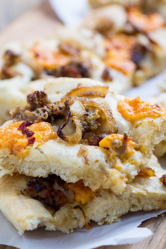 Southern-Style Focaccia with pulled pork, pimento cheese, and vidalia onion.