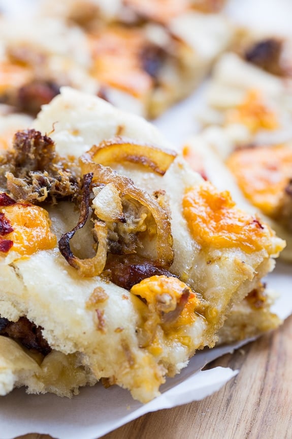 Southern-Style Focaccia with pulled pork, pimento cheese, and vidalia onion.