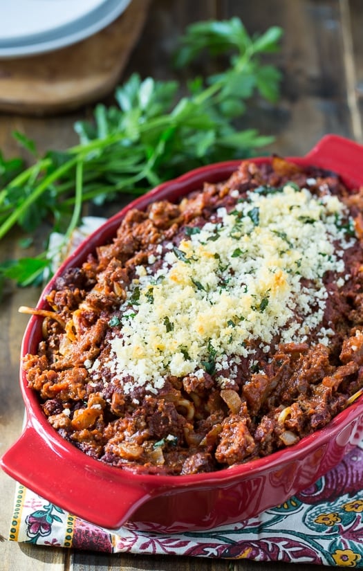 Spaghetti Beef Casserole with a layer of cream cheese and a buttery bread crumb topping.