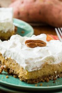 Sweet Potato Bars with a gingersnap crust and a layer of fresh whipped cream