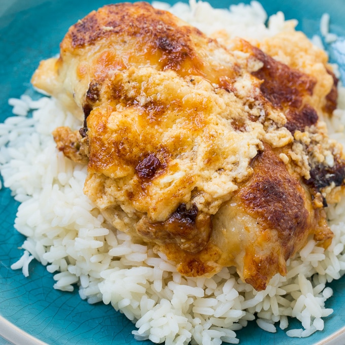 Creamy Baked Swiss Chicken served over rice