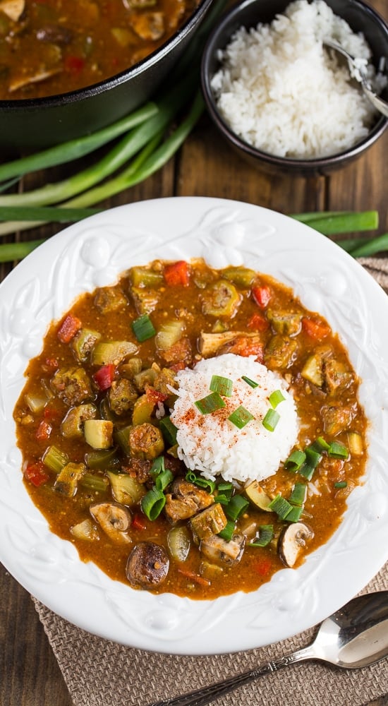 Vegetarian Gumbo made with a rich, dark roux and red beans, okra, mushrooms, zucchini, and bell peppers.