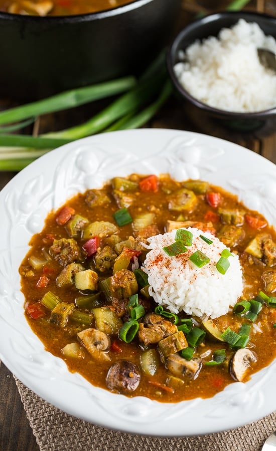 Vegetarian Gumbo made with a rich, dark roux and okra, mushrooms, bell pepper, zucchini, and red beans.